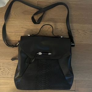 Large leather Mackage Purse with large iPad zipper pocket inside. Lightly used.